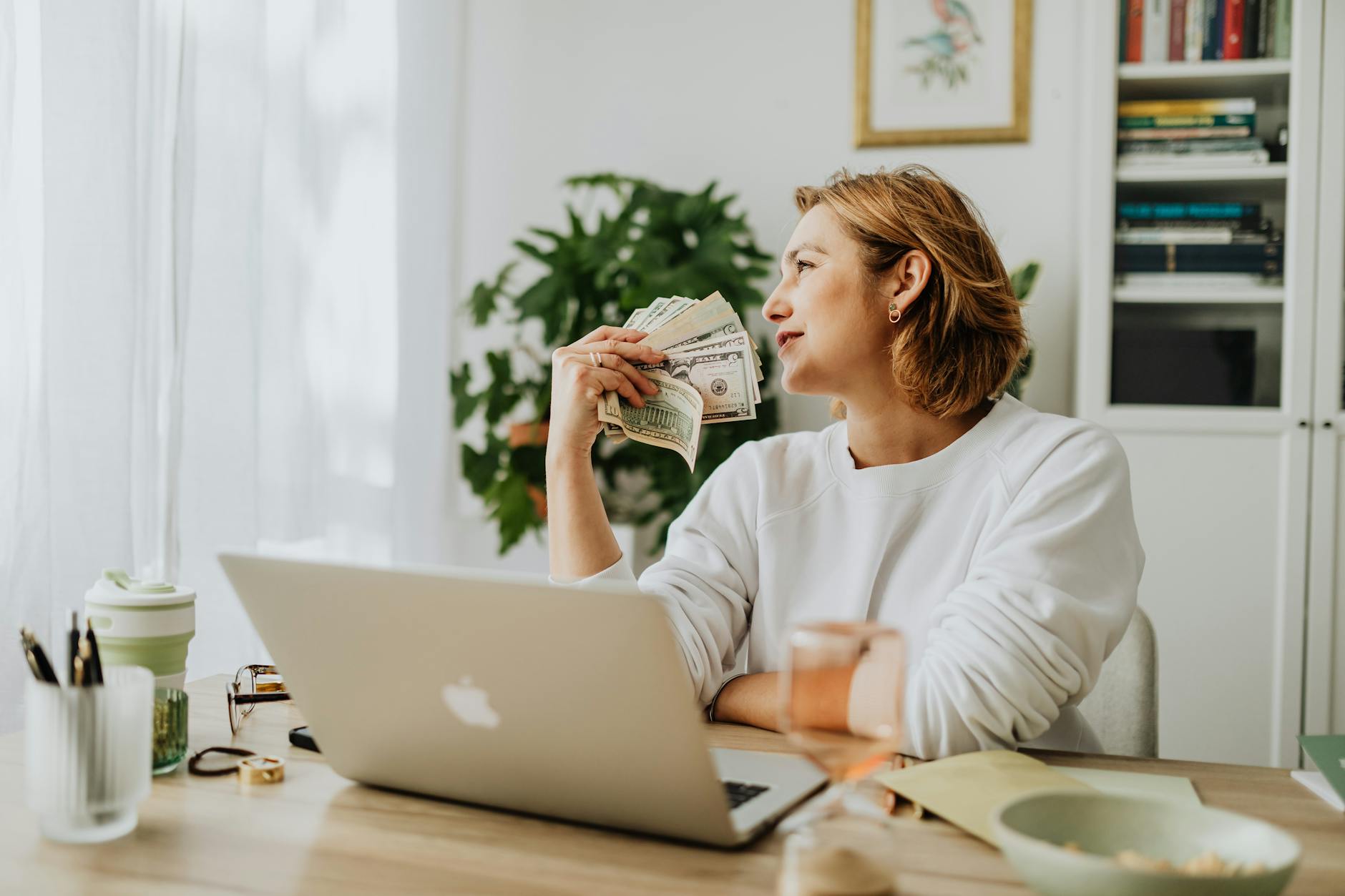 A first sale notification beside side hustle planning notes