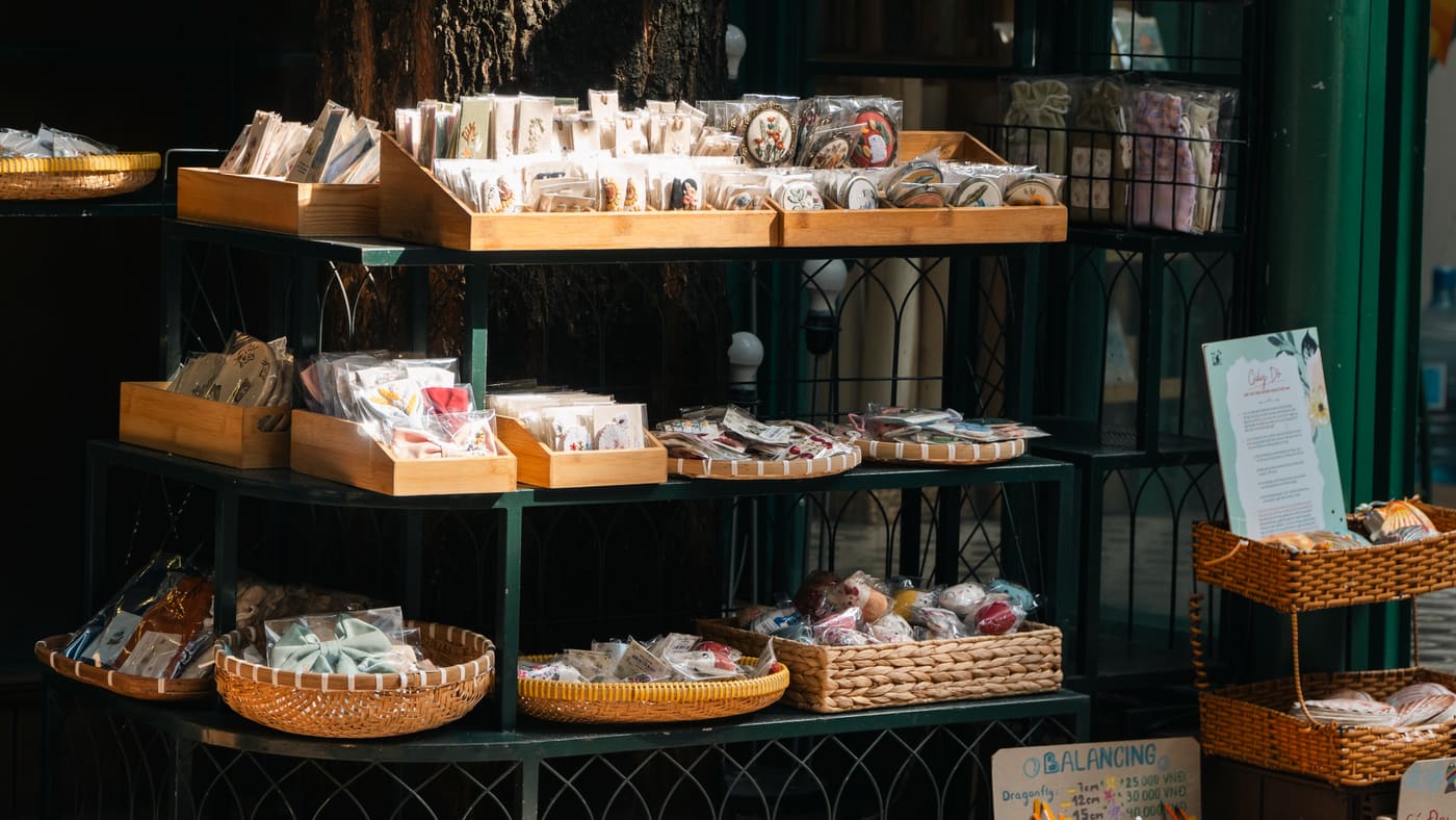 Handcrafted wooden goods displayed on a market stall